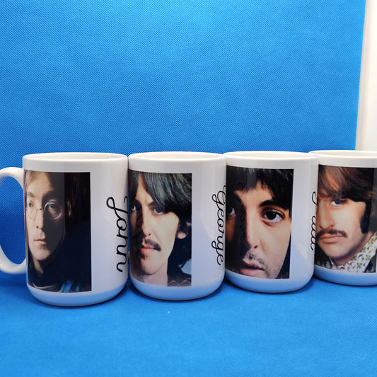 John, Paul, George and Ringo! Great set of coffee mugs! There are two pictures and their names on each one.