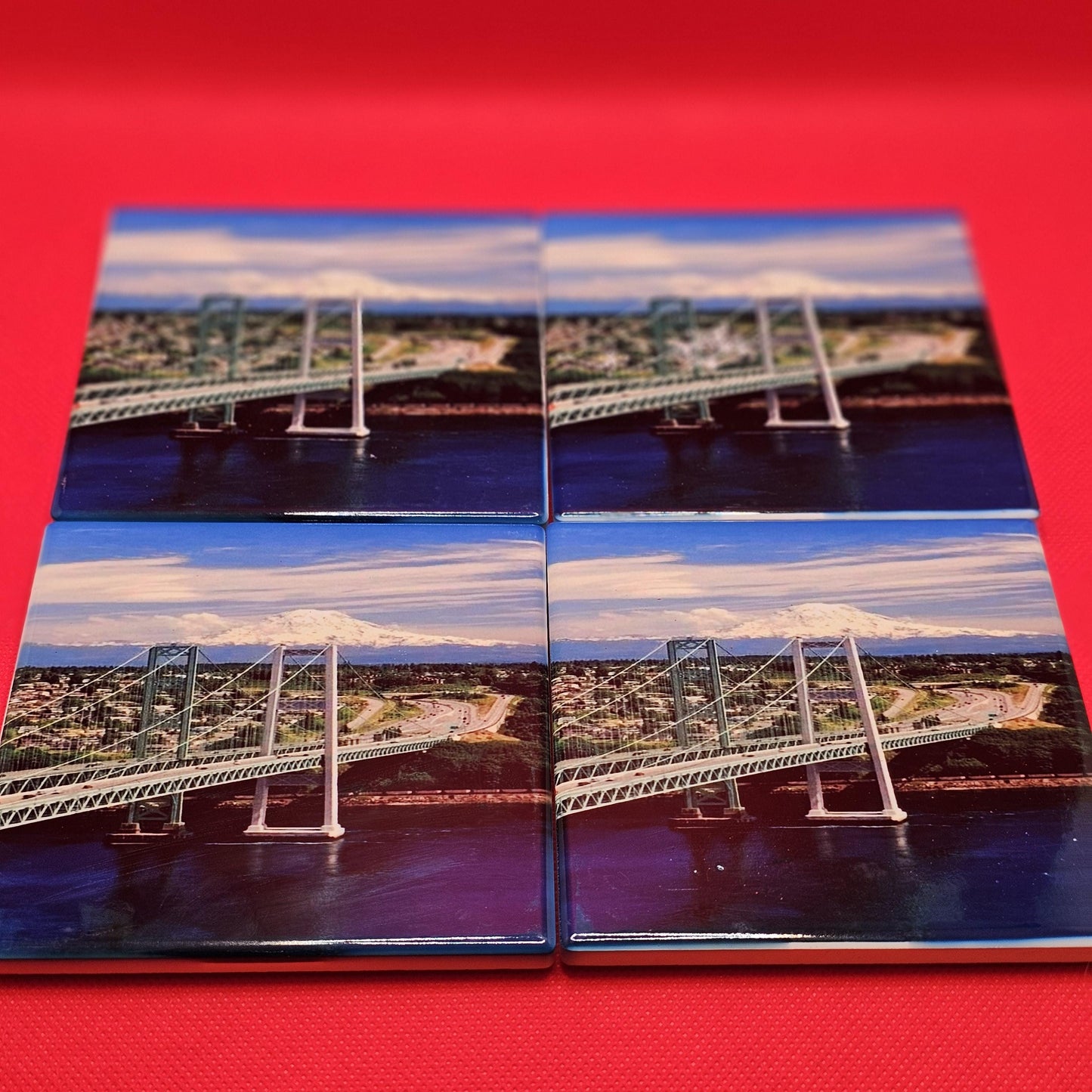 Narrows bridge from Gig Harbor,WA, to Tacoma,WA, Mount Rainier is in the back ground. Beautiful picture, beautiful Coasters Great Gift!