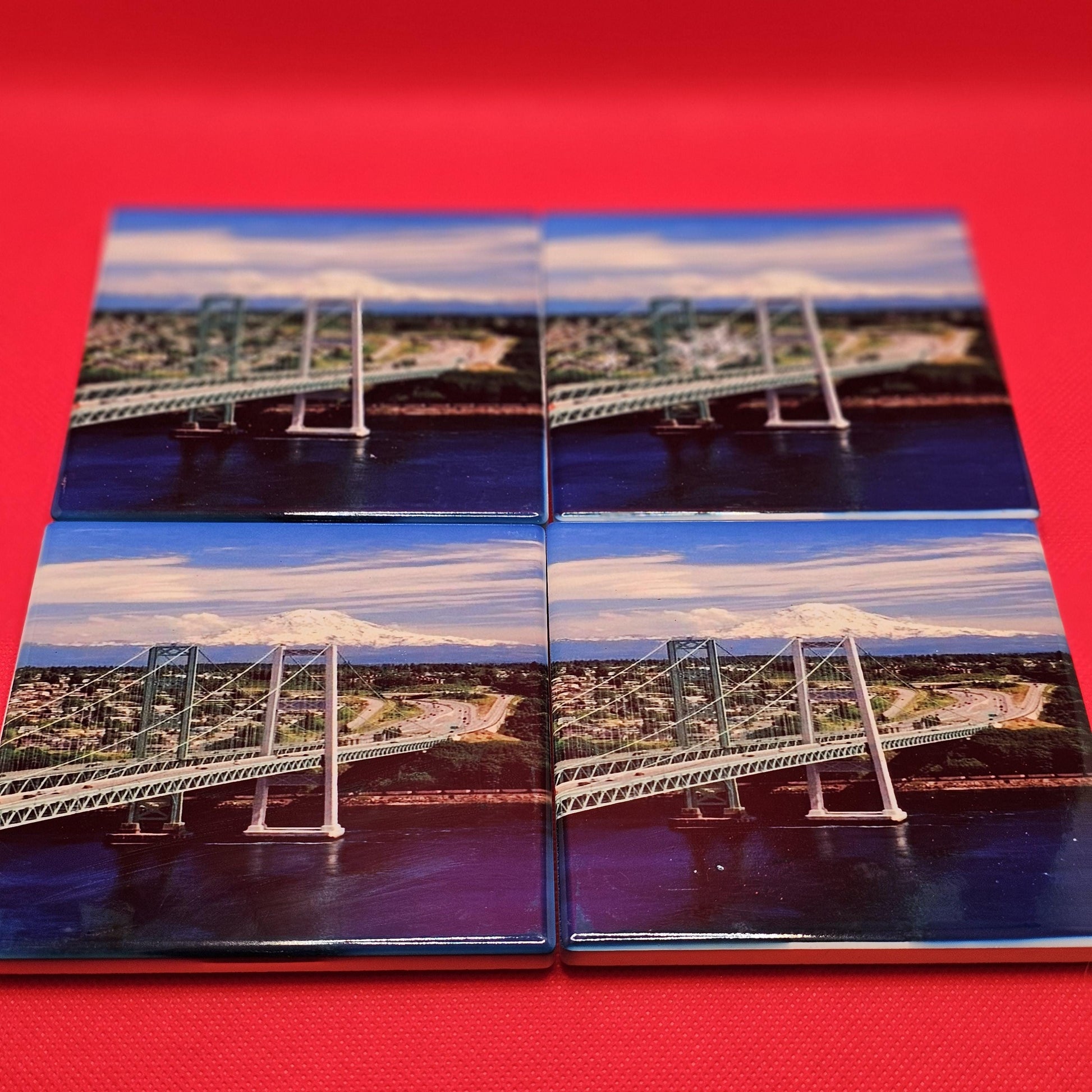 Narrows bridge from Gig Harbor,WA, to Tacoma,WA, Mount Rainier is in the back ground. Beautiful picture, beautiful Coasters Great Gift!