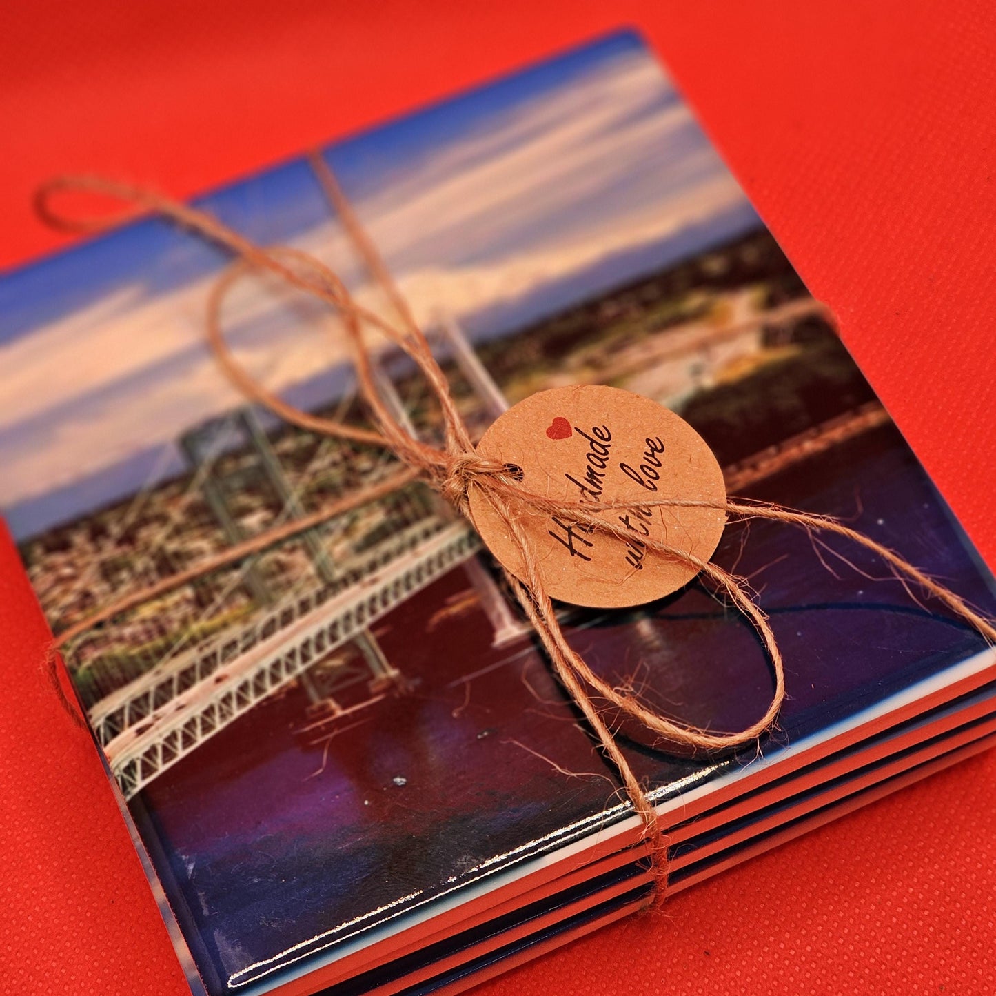 Narrows bridge from Gig Harbor,WA, to Tacoma,WA, Mount Rainier is in the back ground. Beautiful picture, beautiful Coasters Great Gift!